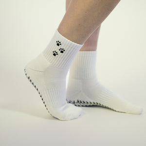 Puppy Chow grip socks by PikeFit: cream crew sock with embroidered paw prints